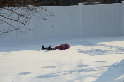 Erynn throwing Greta into the snow11